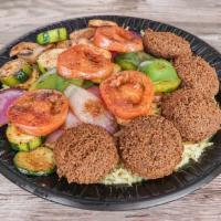 Veggie Falafel Plate · Rice topped with falafel and grilled vegetables. Served with pita bread. Vegetarian.