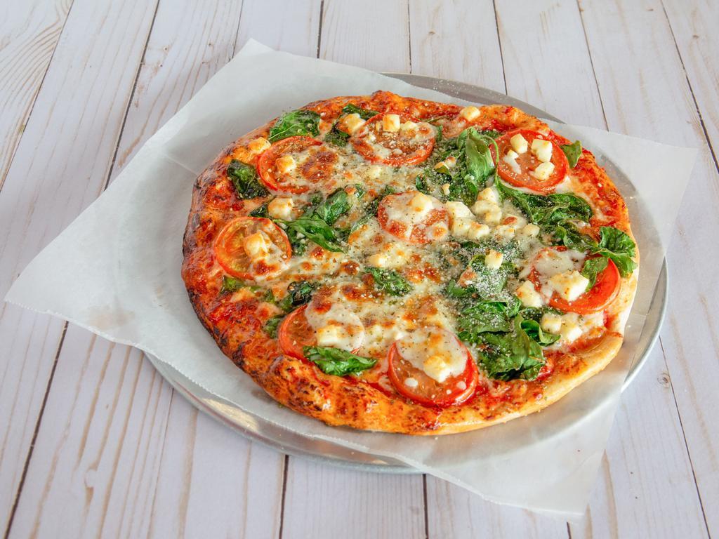 Greek Pizza · Served with spinach, tomatoes, feta cheese and mozzarella cheese.