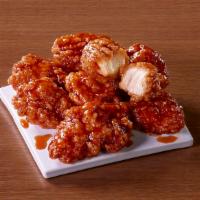 Breaded Bone-Out Wings · 100% all-white meat chicken wings covered in savory breading and your choice of sauce.