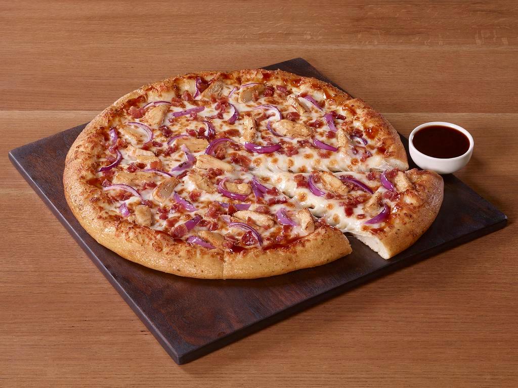 Backyard BBQ Chicken Pizza · BBQ sauce, grilled chicken, bacon and red onion.