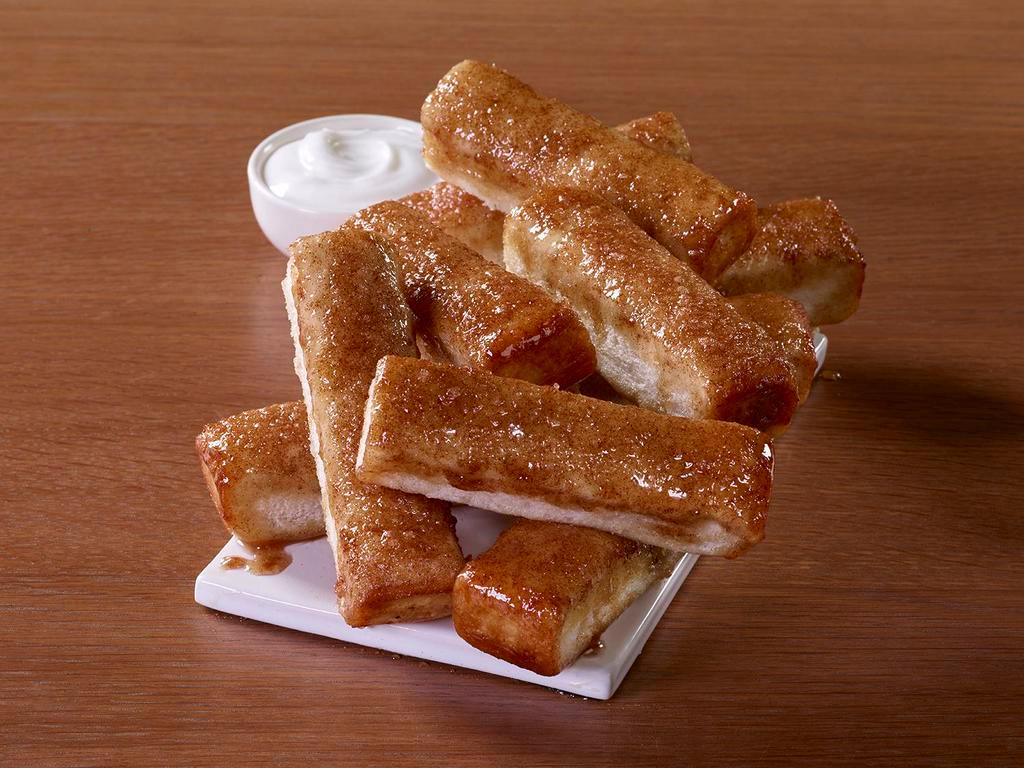 Cinnamon Sticks · 10 cinnamon sticks. Sprinkled with cinnamon and sugar and served with an icing dipping sauce.