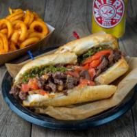 Churrasco Special · Churrasco steak, onion and tomato with chimichurri sauce on a French baguette.