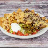 Nachos (Chicken Fajita, Beef Fajita or Shrimp)  · Nachos chips smothered with refried beans and your choice of (Chicken Fajita, Beef Fajita or...