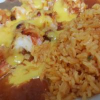 Shrimp Enchiladas · 2 shrimp enchiladas topped with ranchera sauce and cheese. Served with rice and refried beans.