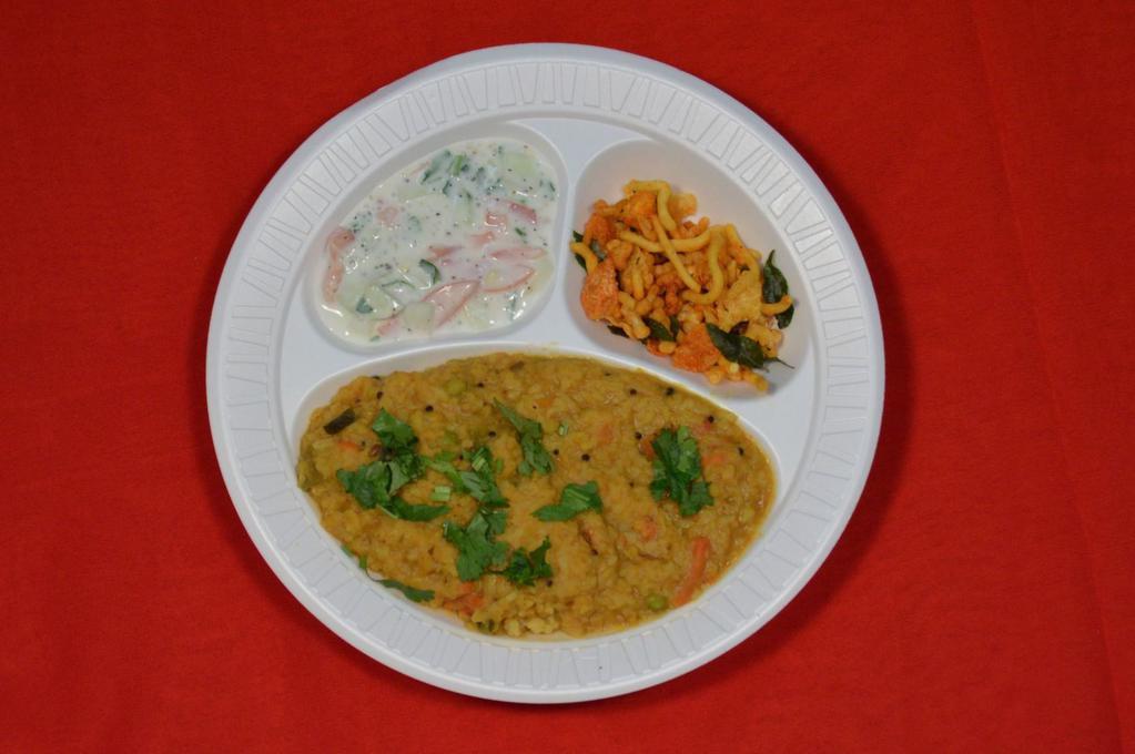 Besibele Bhath · Delicious mix of rice and lentil, cooked with vegetables and medium spices. Gluten free.