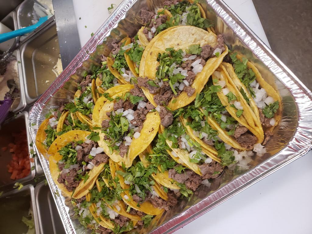 20 Street Taco Party Tray · 20 Street tacos on two soft corn tortillas with your choice of meat topped with onions and cilantro. VERY AUTHENTIC!! 