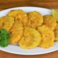 Fried tostones ( Plantain) · 3 slices of fried tostones ( plantain)