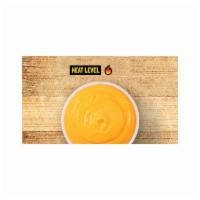 Mac Sauce · Cheddar cheese sauce w/diced jalapeño.