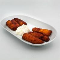 Platanos Fritos · Sweet fried plantains fried to perfection, served with sour cream.