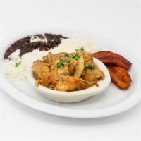 Masitas de Puerco · Cuban-style morsels of pork, marinated in a criolla sauce and onions, served with plantains,...