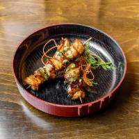 Yakitori · 2 chicken thigh skewers with onions and pepper.