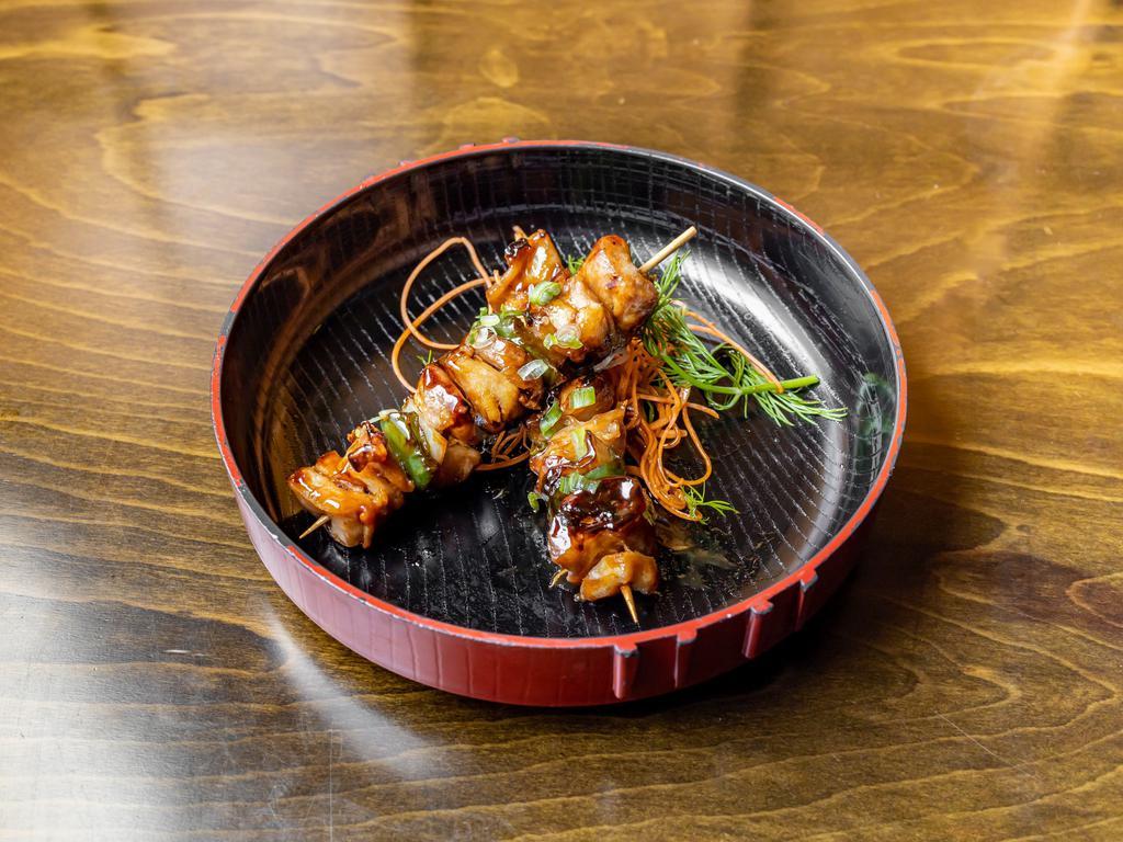 Yakitori · 2 chicken thigh skewers with onions and pepper.