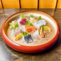 Samurai Sashimi · 2 tuna, 2 yellowtail, 2 tako, 2 saba, 2 salmon, kani, and three white fish. Served with sala...