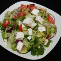 Greek Salad · Mixed green salad topped with peppers, onion, cucumber, tomato and feta cheese served with 1...