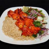 Chicken Breast Kabob · Boneless pieces of chicken breast marinated in special herbs and spices and broiled on a ske...
