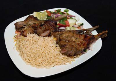 Chopan Kabob · Pieces of tender lamb chops marinated and broiled on a skewer over charcoal.