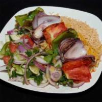 Veggie Kabob · Grilled fresh vegetables on a skewer served on freshly baked Afghan bread with rice, salad a...
