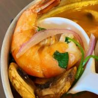 S1. Tom Yum  · An aromatic herbal broth utilizing shrimp stock and lime juice. Includes mushrooms, red onio...