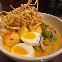 N5 Khao Soi · Northern Thai Coconut Curry Noodle Soup with egg noodles, onions, house pickled mustard gree...
