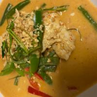 C5. Panang Curry · Panang curry paste in coconut milk includes bell pepper, kaffir lime leaves and topped with ...