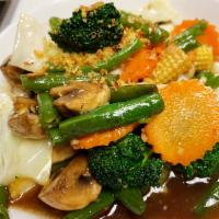 AC6. Stir-Fried Mixed Vegetable · Includes onions, cabbage, carrots, broccoli, mushrooms and bean sprouts sauteed in oyster sa...