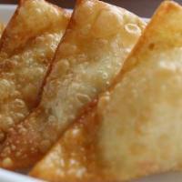 Crab Rangoon · 6 pieces. Cream cheese, crabmeat, and vegetable filling with sweet sour sauce on the side.