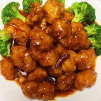 General Tso Chicken · Chunks of fried boneless chicken with hot pepper, simmered in a rich, spicy Hunan sauce. Spi...