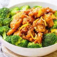 Orange Chicken · Chunks of chicken lightly fried, then sauteed with dried orange peel and hot pepper in a spi...