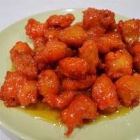74. Orange Chicken · Lightly battered chicken tenders fried to a delicius crisp, then sauteed in our delectable o...