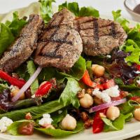 Mediterranean Salad with Grilled Beef · Traditional Mediterranean Salad topped with Grilled Beef
