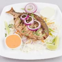 Whole Pomfret Fish Fry · Pomfret marinated in Indian spices and deep fried.
