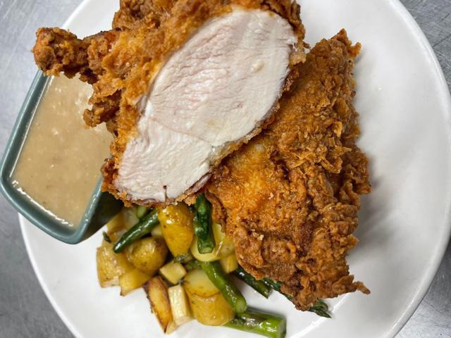 Southern Fried Chicken · Brined and Buttermilk Crusted Breast and Thigh,
Roasted Fingerling Potatoes, Mushrooms, Natural Gravy
