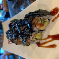 Black Dragon Roll · Crab, avocado, cucumber, topping eel and seaweed with eel sauce.