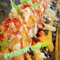 Hoshitori Special Roll · Shrimp tempura, cucumber, topping crab, spicy mayo, crunch, eel sauce, masago and scallion.