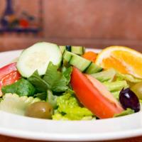 House Salad · Romaine lettuce, English cucumbers, tomatoes, Kalamata olives, carrots, and sliced orange.