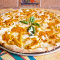 Penne Vodka Pizza · Your favorite pizza topped with freshly made penne sauce, penne pasta, fresh mozzarella.