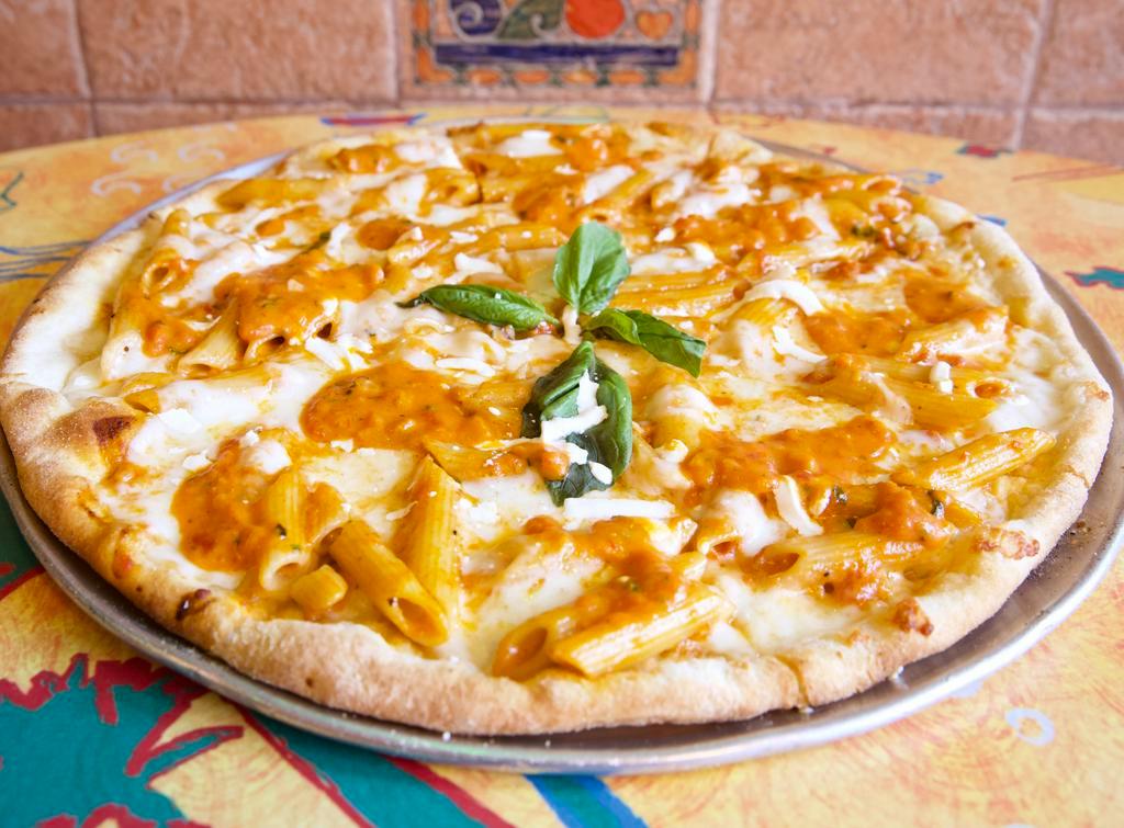 Penne Vodka Pizza · Your favorite pizza topped with freshly made penne sauce, penne pasta, fresh mozzarella.