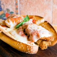 Chicken Marsala Hero · Sauteed organic chicken with fresh mushrooms, gravy, Marsala wine, grated cheese, parsley, a...