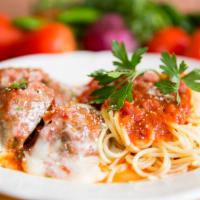 Meatball Parmigiana · Freshly baked meatballs with your choice of pasta and sauce topped with mozzarella cheese. A...