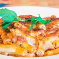 Baked Ziti · Baked in the oven with our homemade sauce, provolone, mozzarella, and Parmesan cheese.