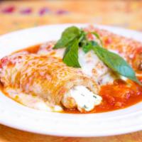 Eggplant Rollatini · Sliced. Eggplant topped with ricotta cheese, marinara sauce, and a bubbly layer of mozzarell...