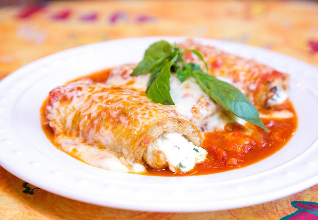 Eggplant Rollatini · Sliced. Eggplant topped with ricotta cheese, marinara sauce, and a bubbly layer of mozzarella cheese.