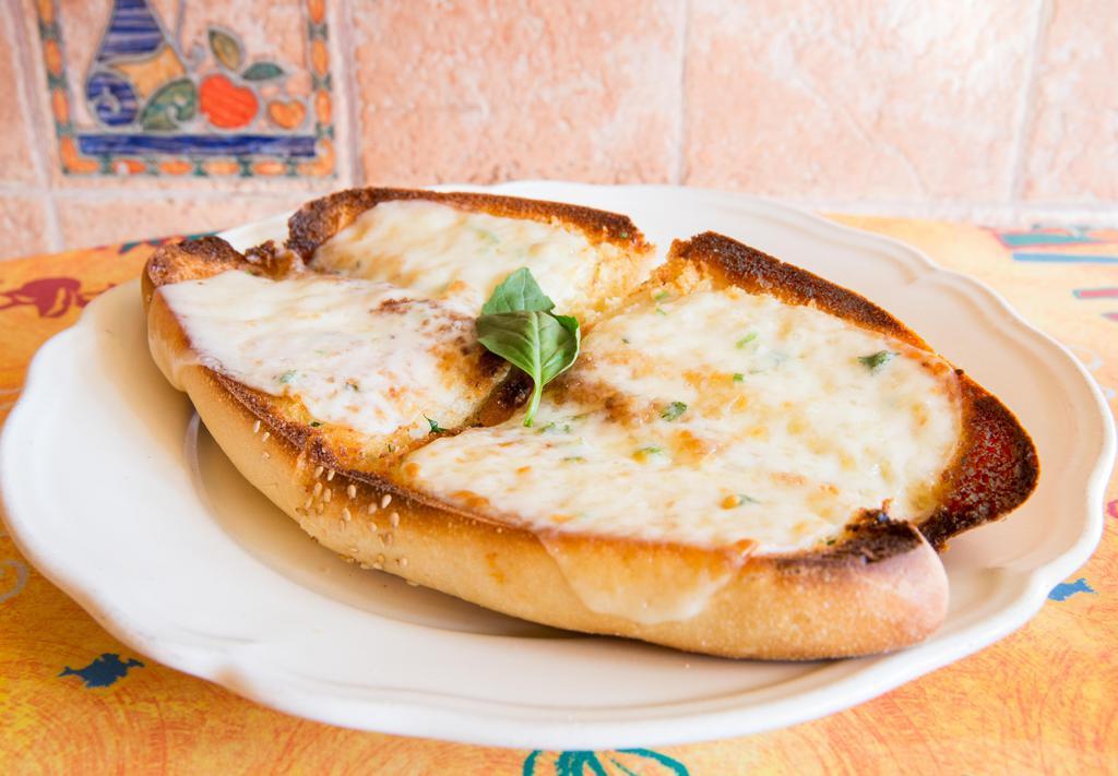 Cheesy Garlic Bread · Your favorite garlic bread maximized with cheese! Includes a side of marinara dipping sauce.
