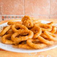 Onion Rings · A delicious batch of beer-battered onion rings.