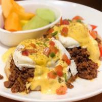 Los Altos Benedict · Chorizo sausage, roasted red peppers, poached eggs, chipotle hollandaise, pico de gallo, and...