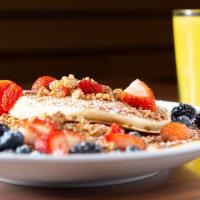 Granola Berry Pancakes · Whole wheat almond granola topped with strawberry, blueberry, and blackberry.