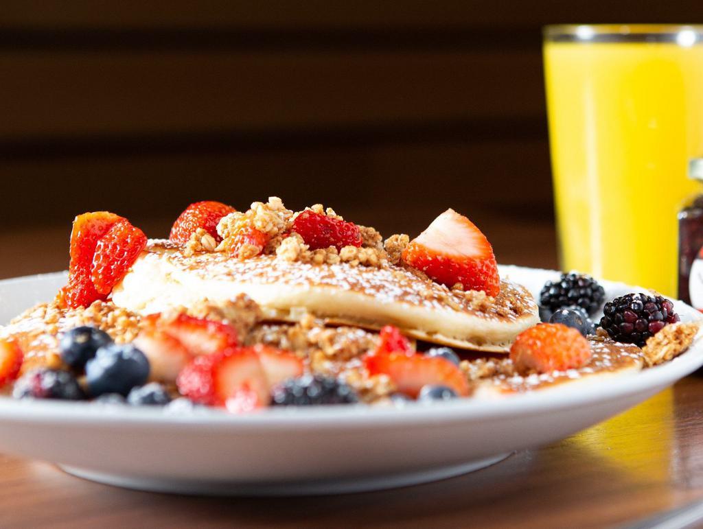 Granola Berry Pancakes · Whole wheat almond granola topped with strawberry, blueberry, and blackberry.