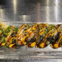 15 Godzilla Roll · Special shrimp, cream cheese, deep fried, eel sauce, spicy mayo and scallion. Hot and spicy.