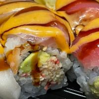 8. Playboy Roll · Spicy crabmeat, avocado, crunchy topped with chef choice fish on top. Raw.