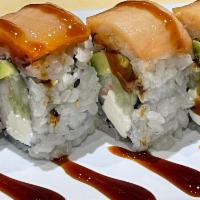 9. Okc Roll · Crabmeat, cream cheese, cucumber, avocado topped with smoked salmon in oven. Cooked.